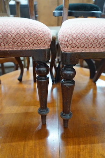 A Victorian circular mahogany breakfast table, diameter 120cm, height 72cm, together with six Victorian mahogany balloon back dining chairs